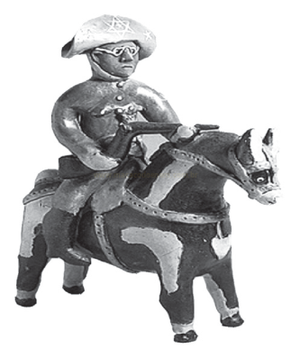 Escultura pintada de um homem de chapéu montado a cavalo, segurando um objeto alongado.