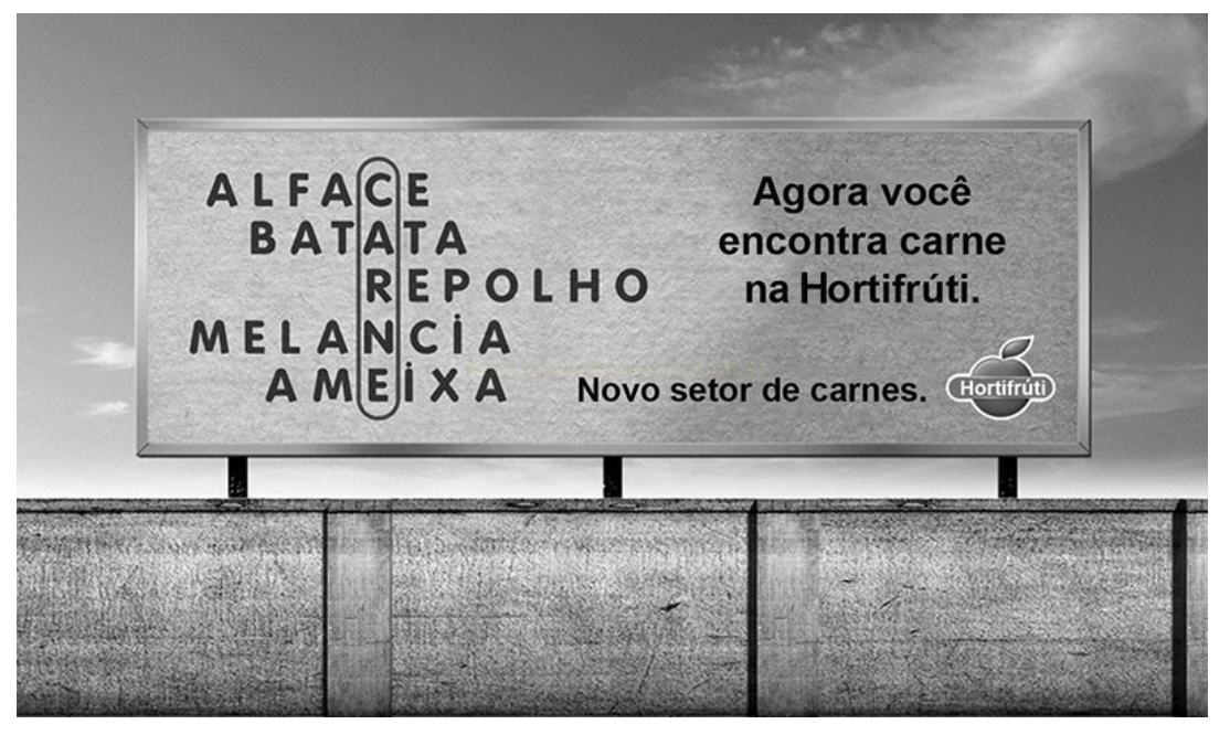 Outdoor em preto e branco com nomes de hortaliças e mensagem publicitária sobre um novo setor de carnes.